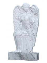 Памятник из мрамора с ангелом и голубем